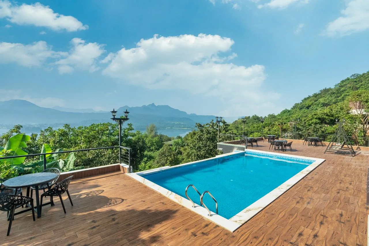 Panoramic Panoramic luxury infinity pool lake mountain view daytime
