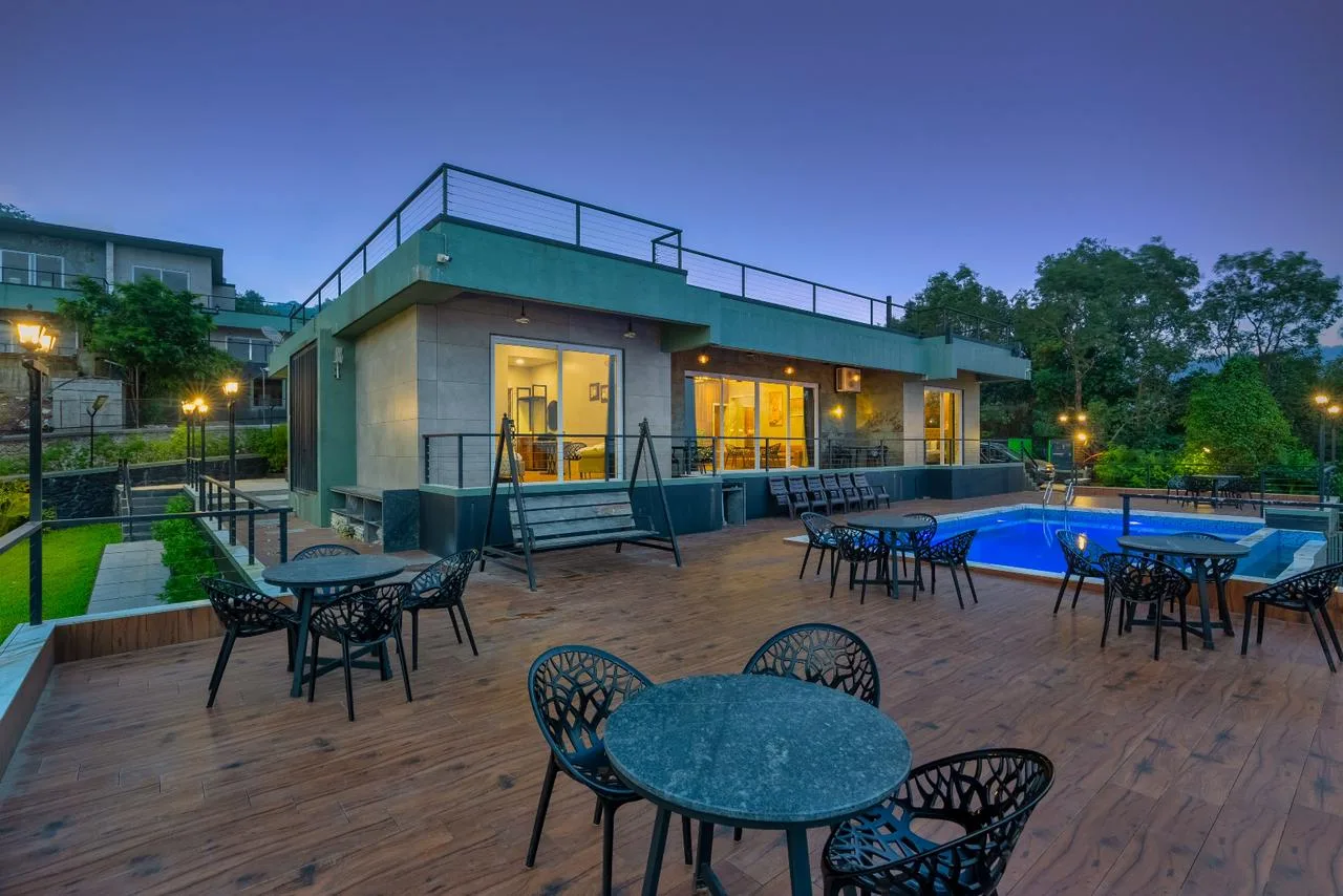 Panoramic Panoramic modern villa exterior private pool evening illumination